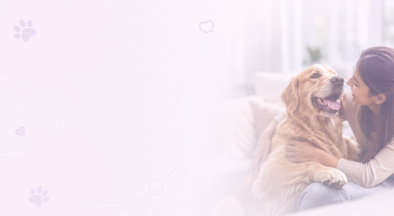 Woman lovingly embracing her golden retriever